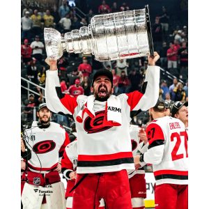 Seth Jarvis Carolina Hurricanes Unsigned 2026 Stanley Cup Champions Raising Cup Photograph
